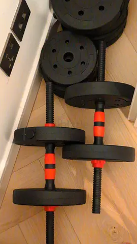 Set of adjustable dumbbells with weight plates - new condition