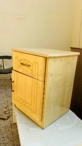 Small wooden bedside cabinet with drawer and door - light oak finish