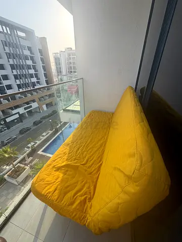 Yellow floor pouf / bean bag chair in good condition