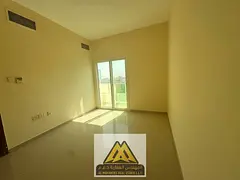 An apartment featuring central air conditioning and a balcony, with a practical layout suitable for 
