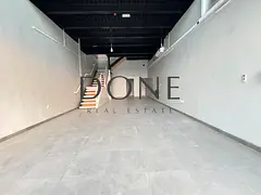 Easy access dubia or Ajman luxury showroom 30 days free 15 kw Electricity MAZZiNE FLOOR office space