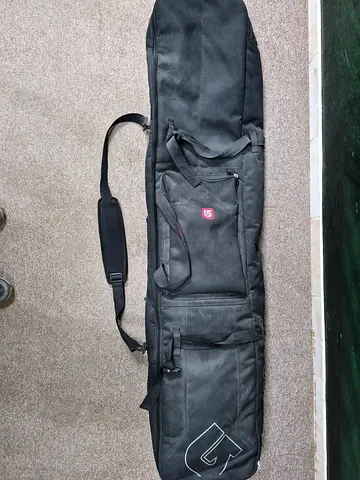 Burton padded snowboard/ski bag with shoulder strap.