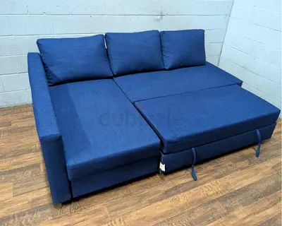 Blue L-shaped Sofa Bed with Pull-Out Section Good Condition