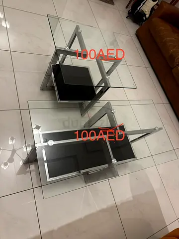 Pair of modern glass side tables with metal frame - set of 2