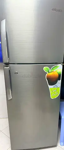 Silver Double-Door Top Freezer Refrigerator - Good Working Condition