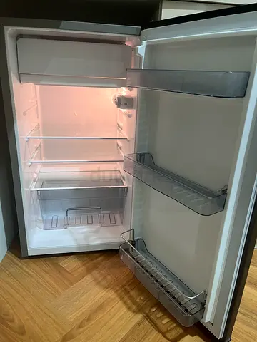 Compact single-door refrigerator in good working condition