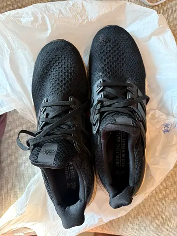 Black breathable running sneakers from Adidas - size not specified, gently used