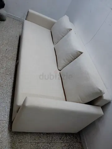 Light beige 3-seater fabric sofa in good condition