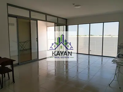 Spacious apartment with two master bedrooms and a living room for annual rent in the Al Ras area, Umm Al Quwain, King Faisal Street.