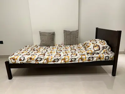 Single dark wood bed frame + mattress with headboard — good condition