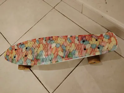Compact colorful plastic cruiser skateboard - good condition