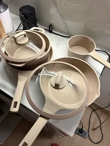 Used 4 piece non-stick cookware set with lids