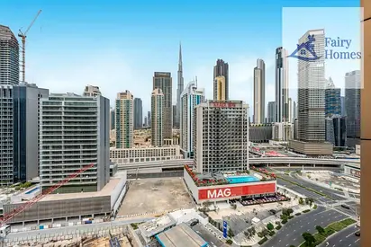 2BR Apartment | ENI Coral Tower | Balcony | Burj & Canal View