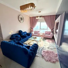 Furnished Two-bedroom apartment with a living room for monthly rent in Ajman, Khalifa Street – Con