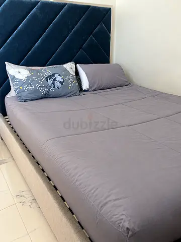 Queen upholstered bed frame with velvet tufted headboard - good condition