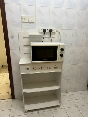 Oven and White Wooden Kitchen Coffee Rack with Shelves