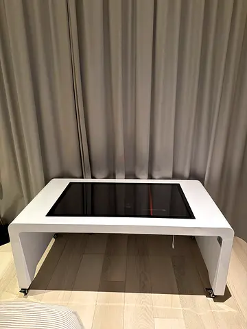 coffee table 43” flat interactive tablet (Good condition) with wheels