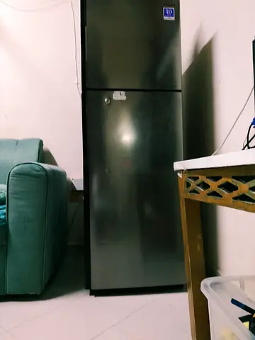 Used two-door refrigerator - good working condition