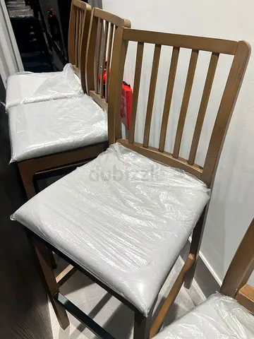 IKEA chair Set of 4 wooden dining chairs with cushions
