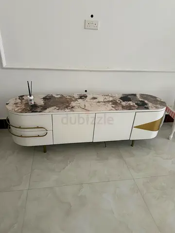 Modern white and gold TV console with marble top - low profile