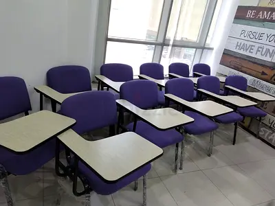 Set of 15 Purple Classroom Chairs with Attached Writing Tablets and two office chairs and one table