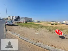 A great opportunity to own a residential plot in Al Helio 1, Ajman, with convenient street and alley