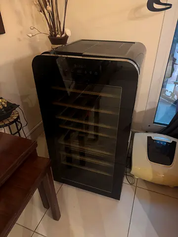 Used freestanding wine cooler / beverage fridge - holds bottles, glass door