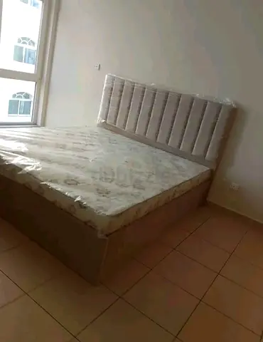 King size upholstered bed frame with mattress (like new)