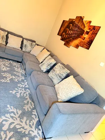 Large L-shaped Gray Fabric Sofa with Cushions - Good Condition