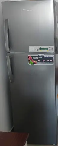 Silver double-door refrigerator - good working condition