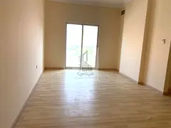Distinctive 2-Bedroom Apartment with Living Room for Rent in Al Hamidiya