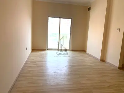 Distinctive 2-Bedroom Apartment with Living Room for Rent in Al Hamidiya