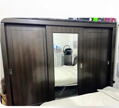 Dark wood sliding door wardrobe with center mirror large double bed dresser6 drawers-good condition