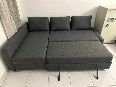 IKEA L-shaped Grey Fabric Sofa Bed with Storage