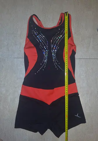 Leotard/gymnastics/dancing classes outfit. Girls 4-7yo. Size approx 62cm length (on photo)