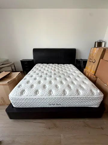 Double bed with two side tables, mattress not included