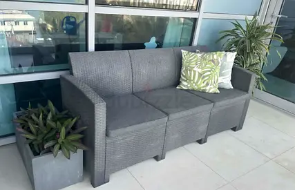 Outdoor rattan-style 3-seater sofa - good condition