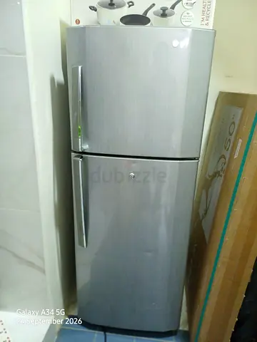 Silver Double-Door Refrigerator - Good Working Condition