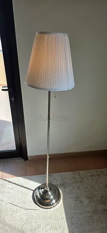 Slim chrome floor lamp with pleated white shade - gently used