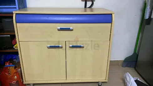 Light wood kitchen storage cabinet with drawer and double doors - good condition