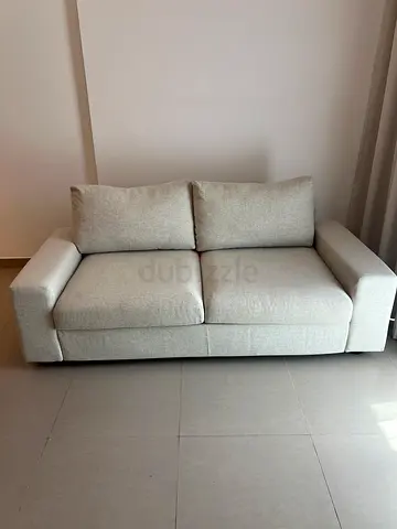 Light 2-seater sofa bed in good condition