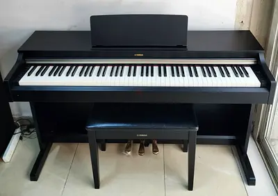 The Yamaha Arius YDP-162B is an 88-key digital console piano designed for students, home players,