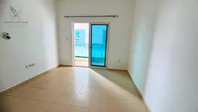 Premium 1BR apartment for annual rent with 2 baths balcony inside parking spacious layout prime loca