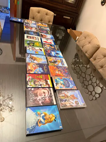 Collection of DVDs — Disney & Family Movies (Toy Story, Aladdin, Alice, more)