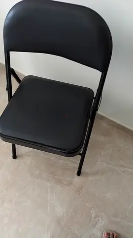 2 Black Folding Metal Chairs with Padded Seat and Back