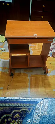 Small wooden computer desk with shelves and wheels - used