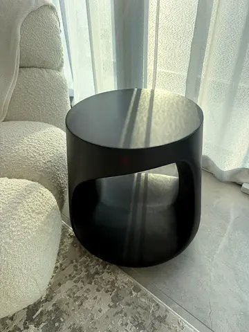 Modern concrete black side table with storage opening