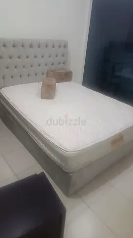 Queen size upholstered bed frame with Intercoil Pillow-Top mattress - Good condition