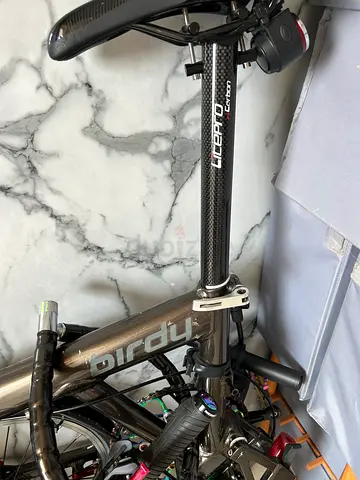 Used road/commuter bicycle — lightweight frame with clip-on handlebar extension