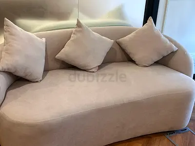 Beige Curved 3-Seater Sofa with Cushions - Good Condition
